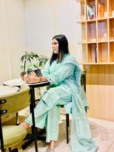 Model wearing BEBANO’s Nehr-e-Noor — a Chikan Kari 3-piece outfit with milky lace detailing and zari cotton dupatta from the Gulzar Collection.